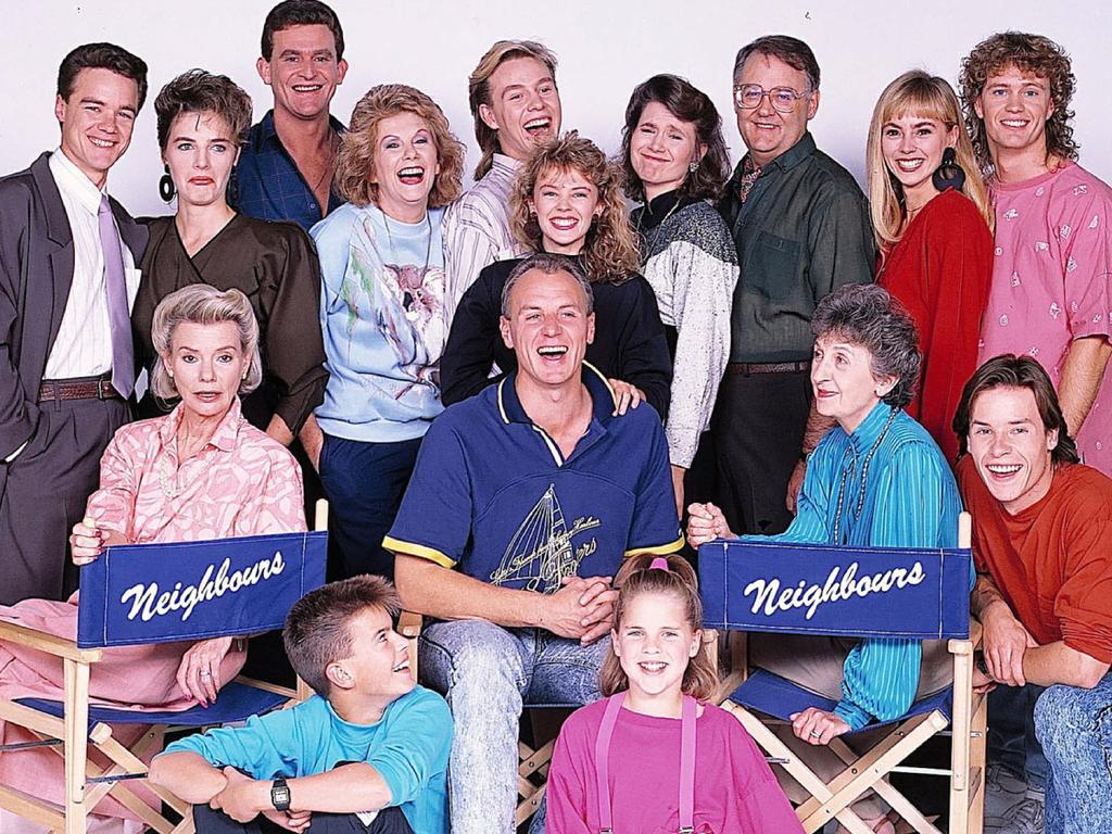 Cast of Neighbours in 1987 (back l-r) Stefan Dennis with Fiona Corke, Paul Keane, Anne Charleston, Jason Donovan, Kylie Minogue, Lisa Armytage, Ian Smith, Annie Jones, Craig McLachlan, (front l-r) Anne Haddy, Kristian Schmidt, Alan Dale, Katie Landers, Vivean Gray and Guy Pearce. Picture: Supplied