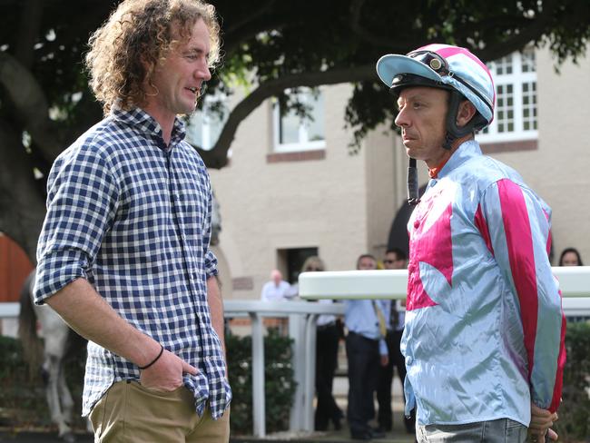 Trainer Ciaron Maher talks with Michael Cahill before the much-anticipated trial of Azkadellia. Picture: Jono Searle