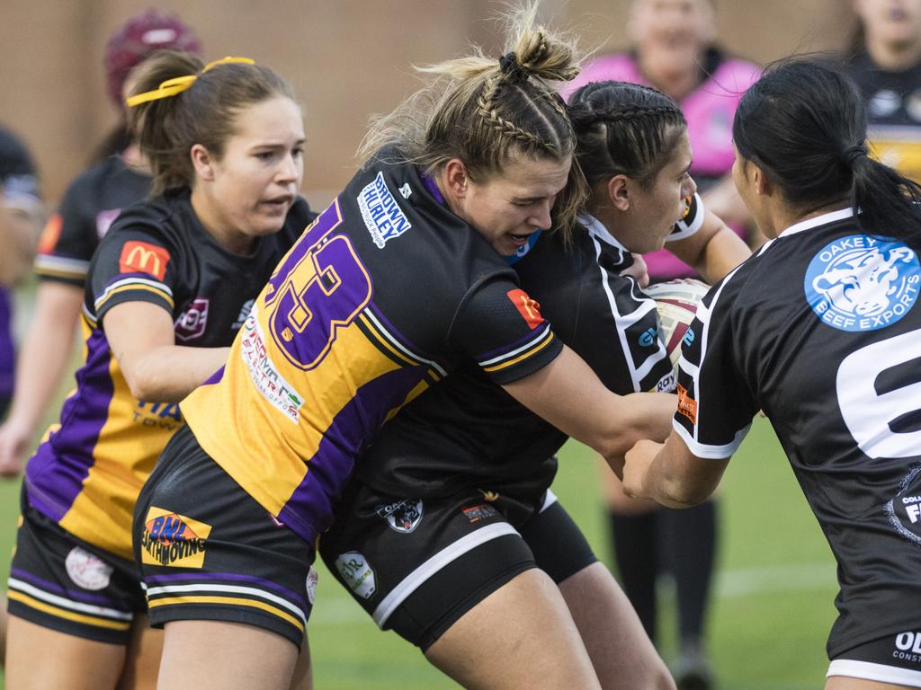 Caitlin Nolan (left) of Gatton tackles Pearl Hood of Oakey. Picture: Kevin Farmer.