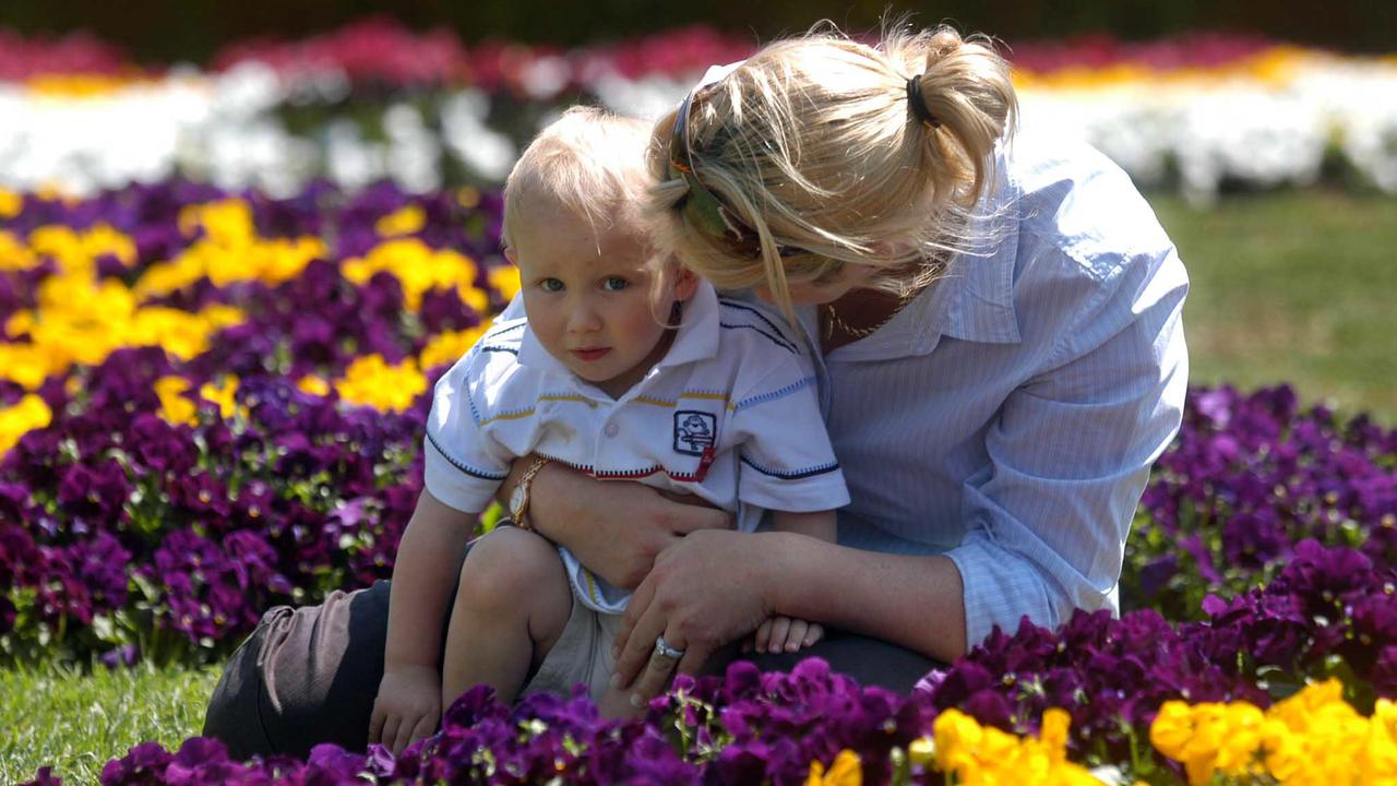 Tania Weier and son Lachlan taking in the colour at the Laurel Bank Park, Toowoomba, which is in full bloom with the Carnival of Flowers only days away.