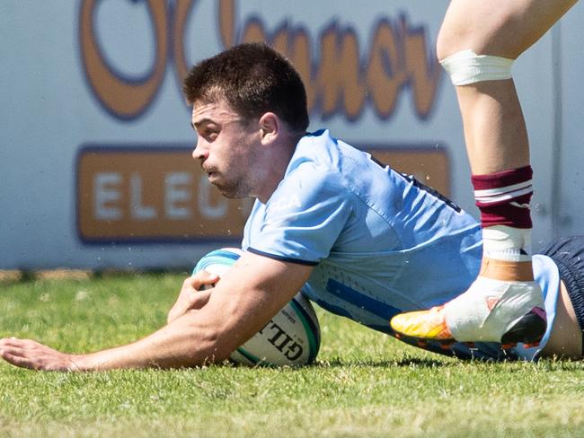 15/10/23. News Local, SportSylvania, Sydney, NSW, Australia.Super Rugby U19sAction from the NSW Waratahs v Queensland Reds Under 19 game at Forshaw Park in SylvaniaNSW player Archie Saunders scores a tryPicture: Julian Andrews