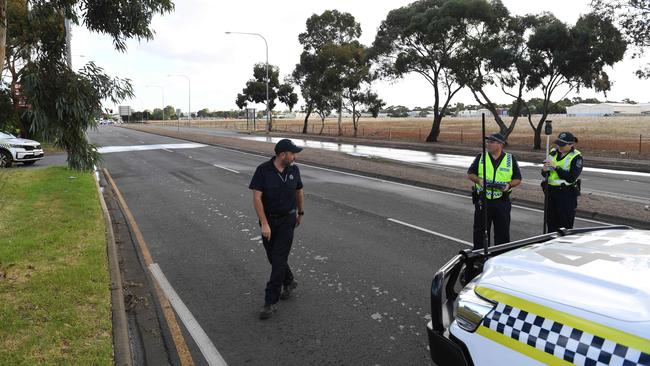 Police at the scene of the fatal crash between a truck and a cyclist on Kings Road at Salisbury South. Picture: Tricia Watkinson