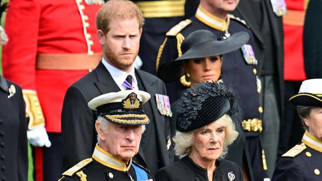 Prince Harry with his father, the now King Charles. Picture: Andy Stenning