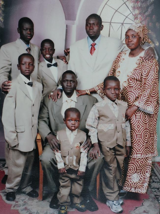 A young Peter, front left, with his family in Sudan