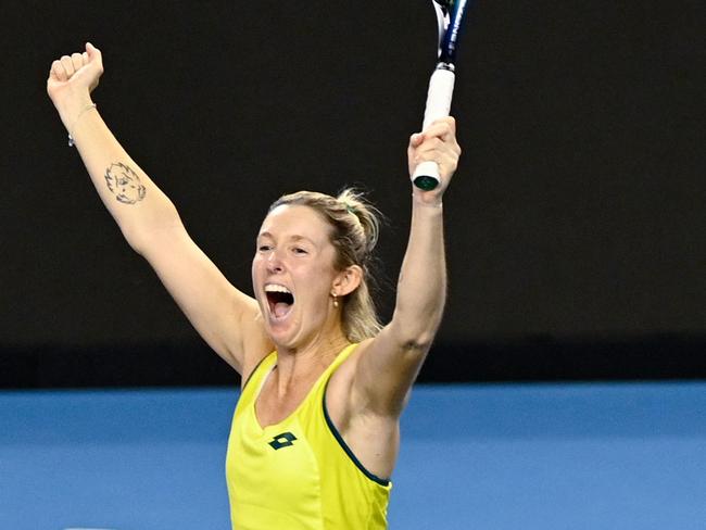 Australia's Storm Sanders celebrates after her win with Australia's Samantha Stosur in their doubles rubber against Britain's Alicia Barnett and Britain's Olivia Nicholls in the semi-final tennis match between Britain and Australia during The Billie Jean King Cup at The Emirates Arena in Glasgow on November 12, 2022. (Photo by Lesley Martin / AFP)