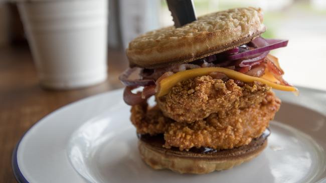 Yes, that is a crumpet bun chicken burger. Picture: Christopher Chan.