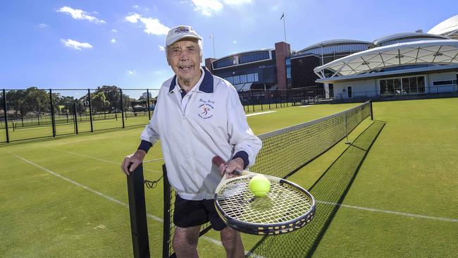 Henry Young, 98, plays at Adelaide’s Memorial drive grass courts. Mr Young was going to nominate for world's oldest tennis player in the Guinness Book of Records, but he doesn't want to pip the current titleholder who is also 98, Ukrainian Leonid Stanislavski. Picture: Roy VanDerVegt