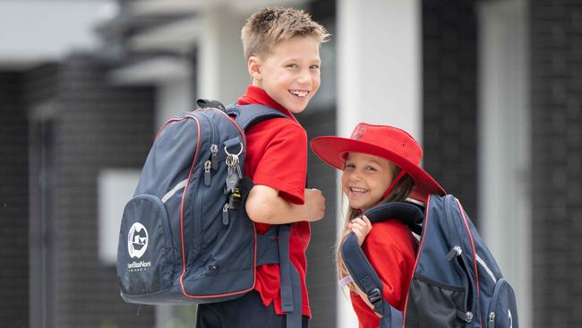 Back to school costs for this year (prices/costs going up). Kids Asher Papadopoulos, 8, and Isla Papadopoulos, 4, in their school uniform with books/bags. Picture: Tony Gough