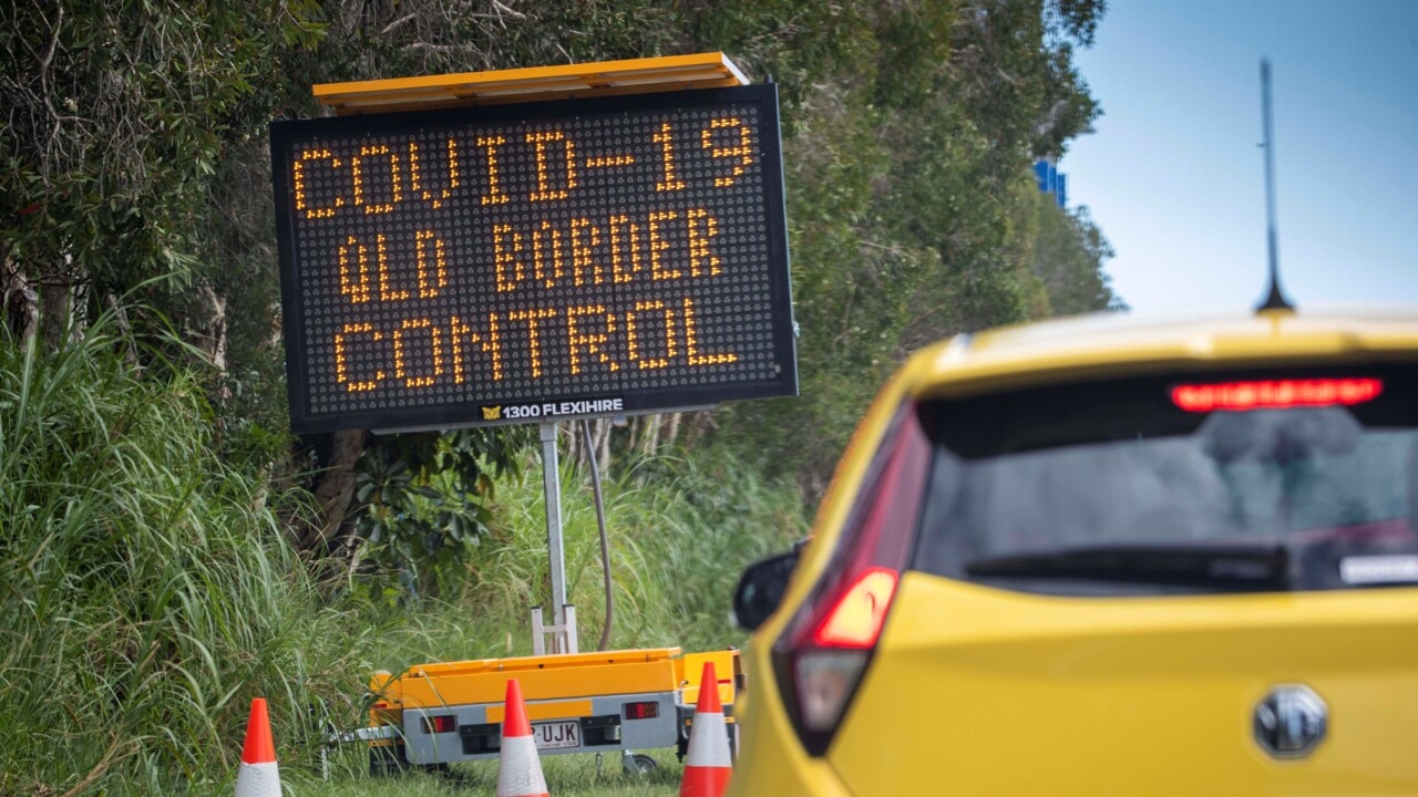 Queensland warns travellers of long delays at border checkpoints