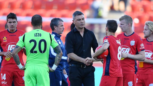 Wellington Phoenix coach Mark Rudan shakes hands with Adelaide United’s captain Isaias in a 0-0 draw at Coopers Stadium in January. Picture: AAP Image/David Mariuz