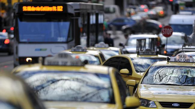 Trams and taxis in Melbourne.