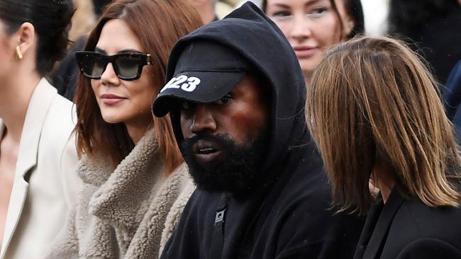 US rapper Kanye West, centre, attends the Givenchy Spring-Summer 2023 fashion show during the Paris Womenswear Fashion Week, in Paris, on October 2. Picture: AFP