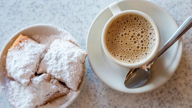 Beignets and coffee in New Orleans is a delicacy. Picture: iStock