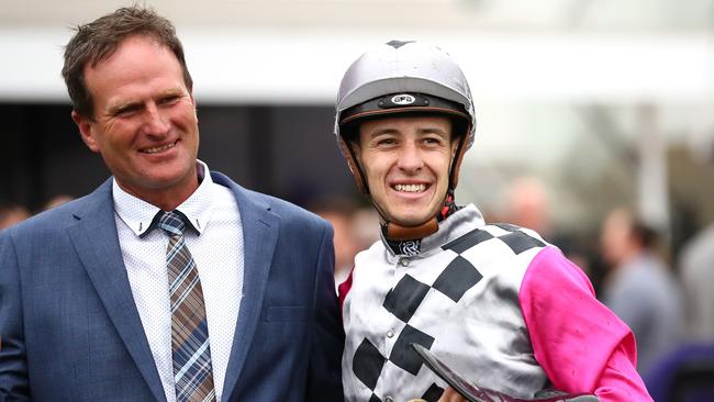 Trainer Paul Pruesker with Surprise Baby’s former jockey Jordan Childs.