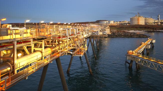 The LNG loading jetty at the Pluto gas project in Western Australia. Woodside has switched focus to selling a 50 per cent share of an expanded Pluto LNG plant.