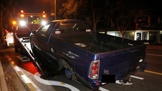 The ute being taken away following the incident. Picture: Josh Woning