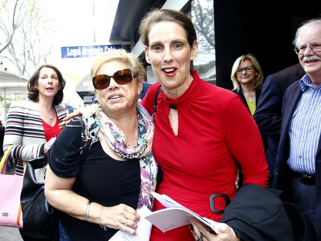 Karen Pensabene from Save our Strathfield with Mosman councillor and Save our Councils president Carolyn Coorigan outside the Land and Environment Court. Picture: John Appleyard.