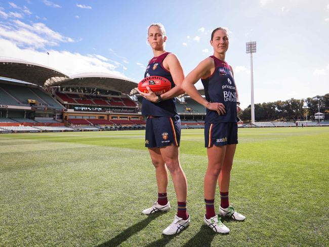 Kate Lutkins (L) & Rea Lugg are both serving members of the ADF and players for the Brisbane Lions. Saturday will see them face off against the Adelaide Crows in the AFLW Grand Final held at the Adelaide Oval. Picture: James Elsby