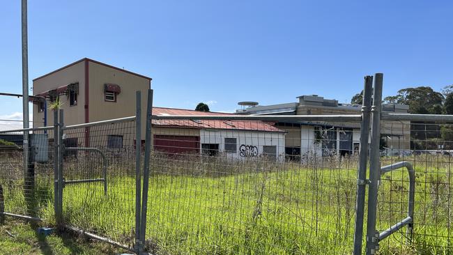 The vacant block next to Dan Murphy's has been left untouched for years. Picture: Tom McGann