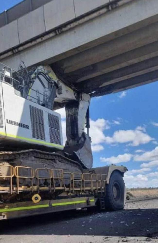 Peak Downs Highway shut after digger stuck under bridge at Caval Ridge ...