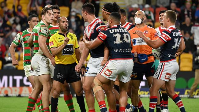 Trouble flared after Roosters centre Joe Manu, centre, was hit with a high tackle