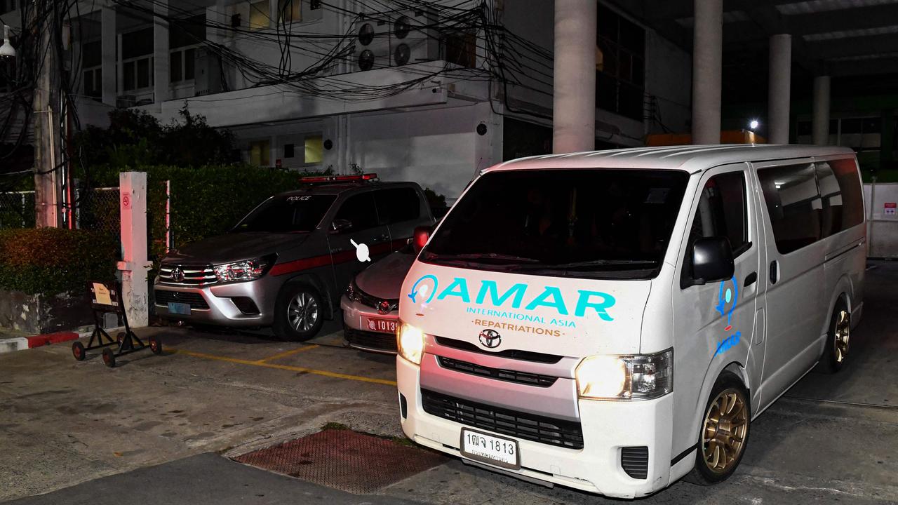 An ambulance carrying the body of Australian cricket player Shane Warne leaves the Police General Hospital in Bangkok. Picture: AFP