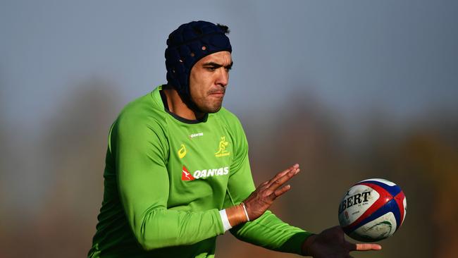 Rory Arnold catches the ball during an Australia training session at Harrow School.