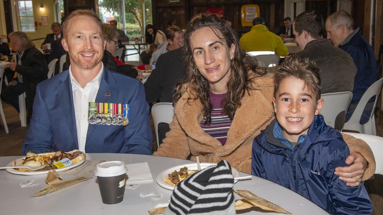 (from left) Ben, Mikaela and Odin Phillips enjoy the Gunfire breakfast at The Goods Shed on ANZAC DAY. Ben served in the Infantry Corp, 6th Battalion and 8/9 Battalion. Tuesday, April 25, 2023. Picture: Nev Madsen.