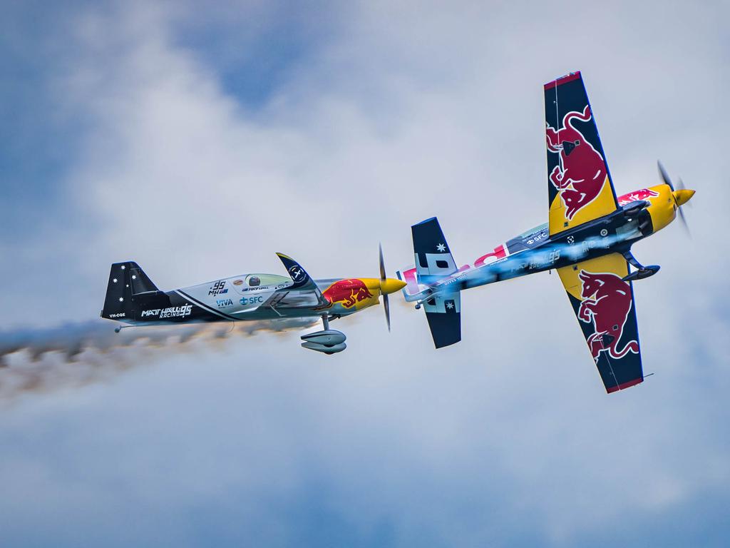 Matt Hall and Emma McDonald piloting the Red Bull racing planes at the Pacific Airshow Gold Coast. picture: Craig Mayne