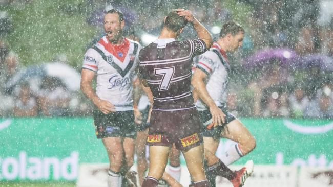 Manly had a tough night against the defending premiers. (AAP Image/Steve Christo)