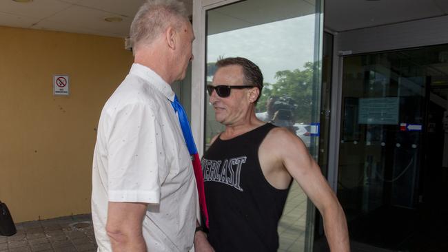 Former Onkaparinga councillor Robert de Jonge is confronted outside Christies Beach Magistrates Court. Picture: Brett Hartwig