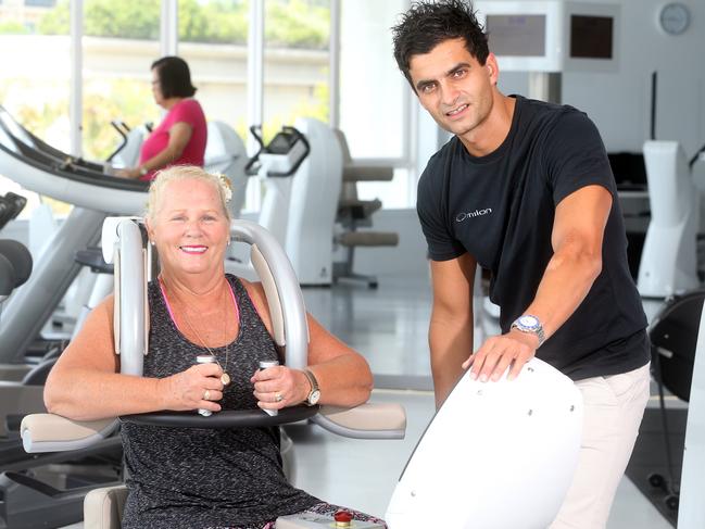 Woman of the Year finalist Linda Monro has been playing and coaching netball for 45 years. Her gym, Milon is sponsoring finalists with gym memberships. She is pictured with gym owner Marcin Lazinski.