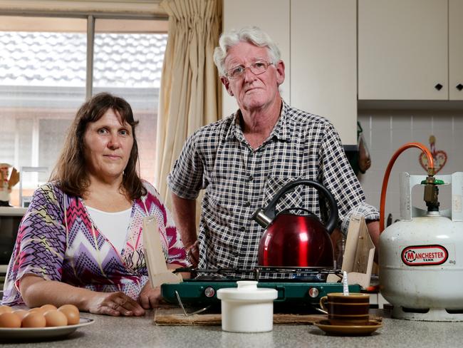 Kerry and Frank Crowley from Riverstone are both pensioners in their late 50s and save power by using a gas camp stove and turn their hot water off every night. Picture: Jonathan Ng