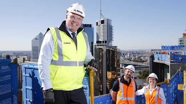 Managing director of Watpac Ltd Martin Monro with contract administrator Will Isaac and project assistant Rebecca Skehan in support of daylight saving. Picture: AAP/Josh Woning