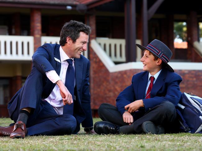 The Southport School teacher Jackson Elliott with Year 7 student Alastair Philp, 13. Picture: Adam Head