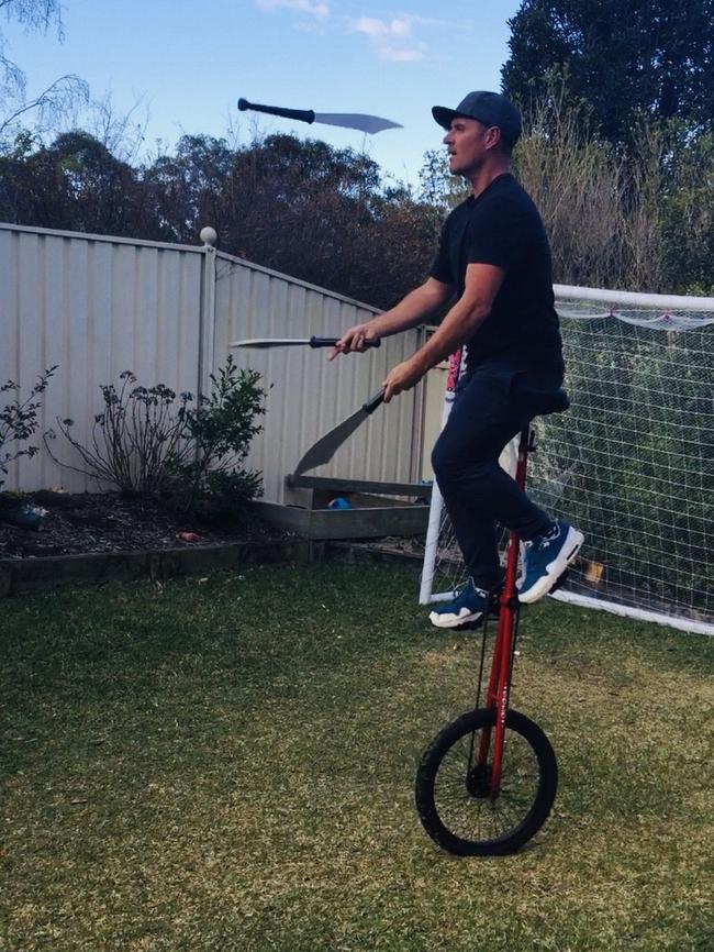 Tim Douglas on one of his unicycles.