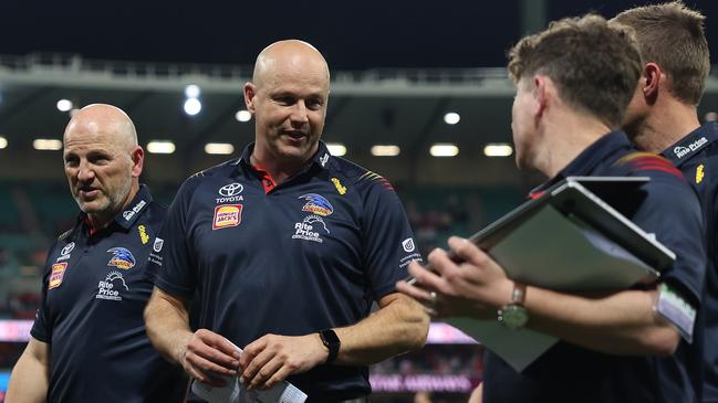 SYDNEY, AUSTRALIA - AUGUST 24: Matthew Nicks, Senior Coach of the Crows talks to coaches after defeat during the round 24 AFL match between Sydney Swans and Adelaide Crows at Sydney Cricket Ground, on August 24, 2024, in Sydney, Australia. (Photo by Mark Metcalfe/AFL Photos/via Getty Images)