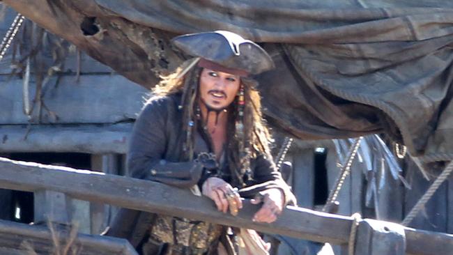 The real Johnny Depp shooting scenes on board The Dying Gull on the set of Pirates of the Caribbean: Dead Men Tell No Tales at The Spit. Pics Tim Marsden