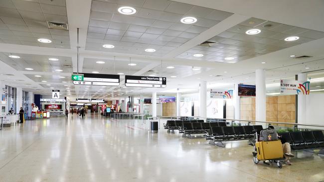 The normally bustling arrivals hall of Sydney International Airport. Picture: Richard Dobson