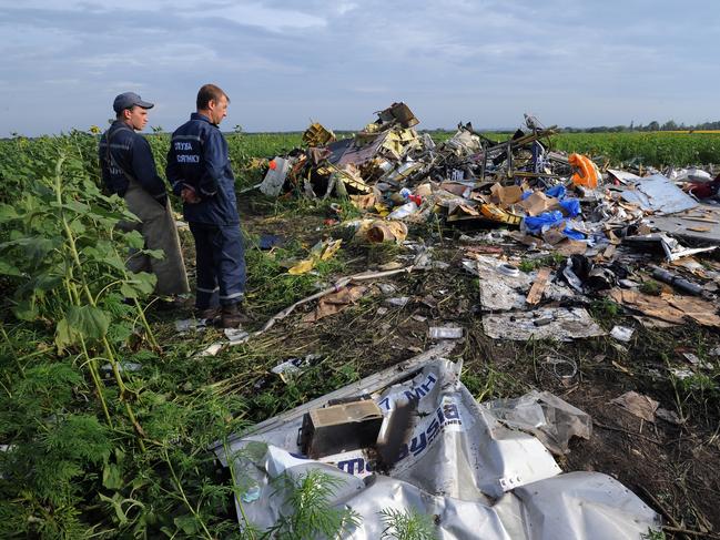 Authorities at the scene of the crash in 2014. Picture: AFP