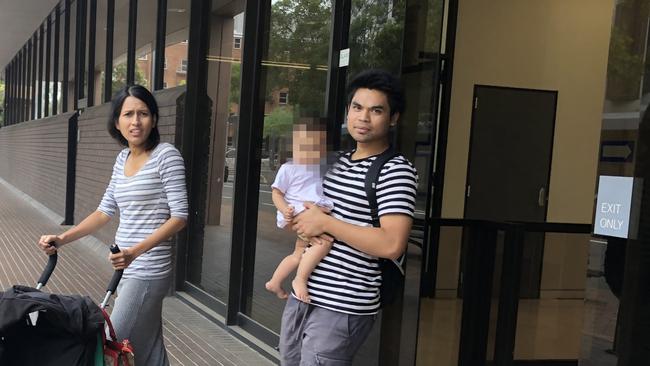 Accused disqualified driver Aung Win with his daughter and wife Zin Nwe outside Parramatta Local Court.