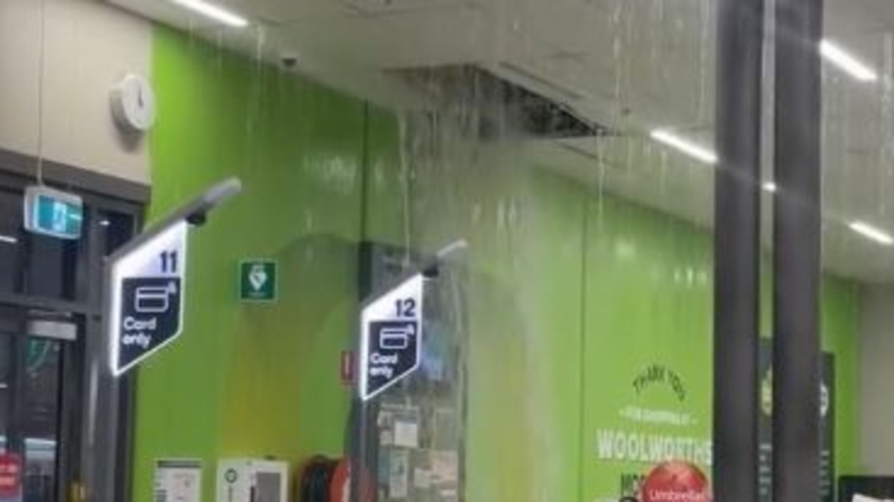 Woolies roof caves in after hail storm