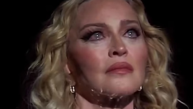 Madonna broke down in tears on stage as she remembered a friend who died while she held their hand. Picture from X.