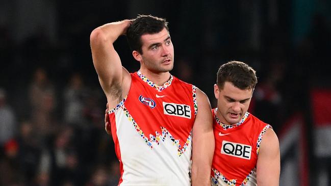 MELBOURNE, AUSTRALIA - JULY 07: Logan McDonald and Tom Papley of the Swans react following the round 17 AFL match between St Kilda Saints and Sydney Swans at Marvel Stadium, on July 07, 2024, in Melbourne, Australia. (Photo by Morgan Hancock/AFL Photos/via Getty Images)