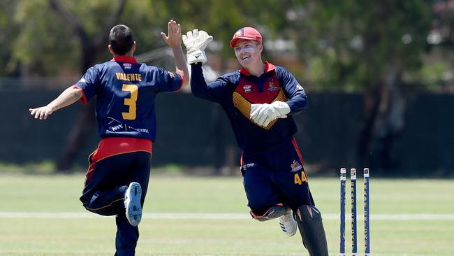 West Torrens batsman Pat Fisher is run out by Adelaide bowler Cameron Valente, who celebrates with wicketkeeper Alex Eckland. Picture: Naomi Jellicoe