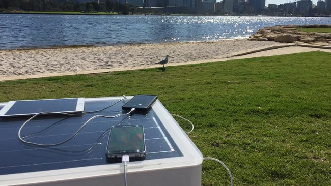 Charge your phone at a park bench ... all with solar power.