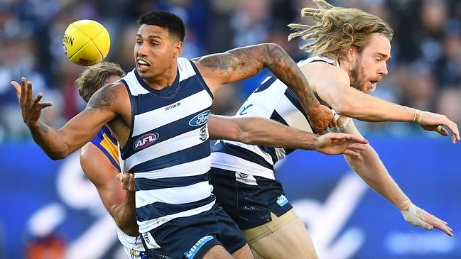 Mark Hutchings clamps down on Tim Kelly earlier this year. Picture: Quinn Rooney/Getty Images.