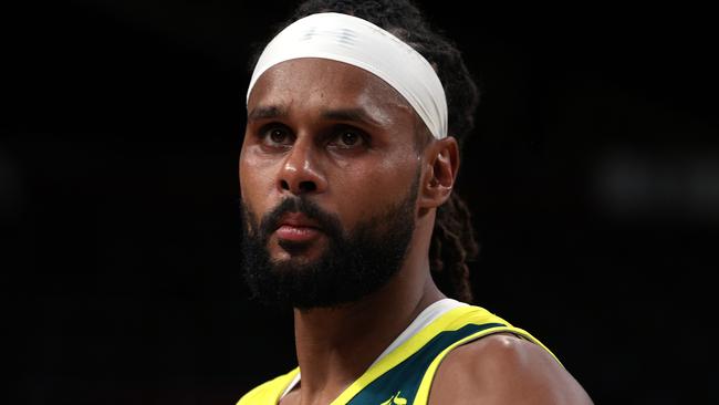 SAITAMA, JAPAN - AUGUST 05: Patty Mills #5 of Team Australia looks on following Team Australia's loss to Team United States in a Men's Basketball quarterfinals game on day thirteen of the Tokyo 2020 Olympic Games at Saitama Super Arena on August 05, 2021 in Saitama, Japan. (Photo by Kevin C. Cox/Getty Images)