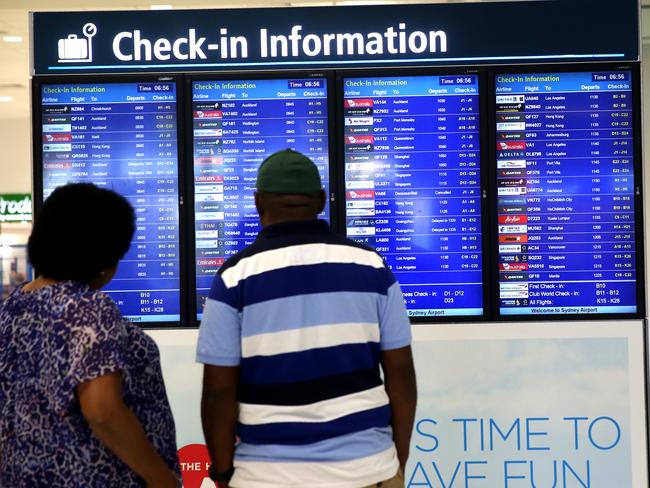 Passengers at the departures gate at Sydney international airport soon won’t be handed a green departure card to fill out. Picture: John Grainger