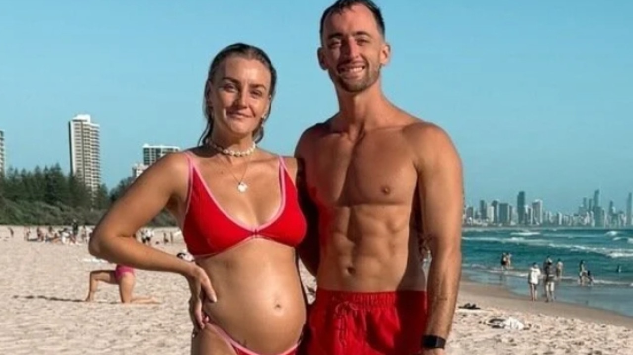 Sarah Maxwell with partner Lewis Christie on the beach. Picture Supplied